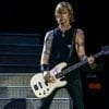 Duff McKagan performing with Guns N Roses in 2017