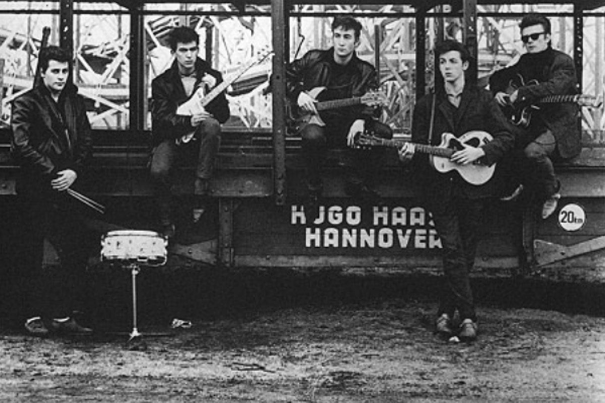 Early Beatles publicity photo with Stuart Sutcliffe